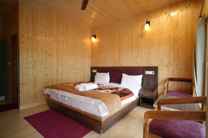 Imagen de la habitación del Hotel Heaven Resorts. Foto 13