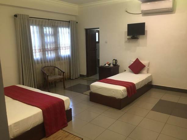 Imagen de la habitación del Hotel Heaven Seven Kandy. Foto 6
