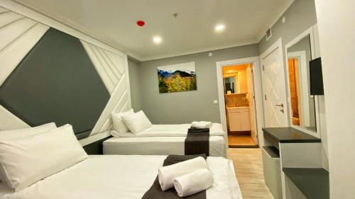 Imagen de la habitación del Hotel Heaven Suite. Foto 19