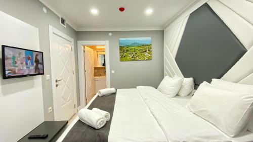 Imagen de la habitación del Hotel Heaven Suite. Foto 20