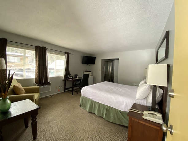Imagen de la habitación del Hotel Heavenly Inn. Foto 10