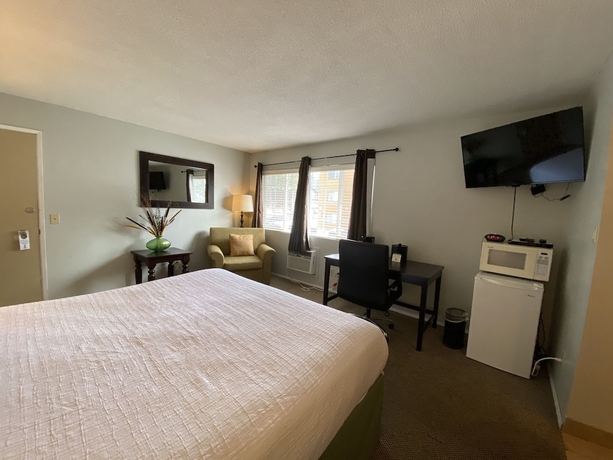 Imagen de la habitación del Hotel Heavenly Inn. Foto 11