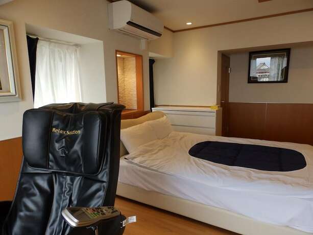 Imagen de la habitación del Hotel Heavenly Mujuan. Foto 2