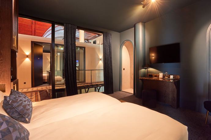 Imagen de la habitación del Hotel Heavens. Foto 19