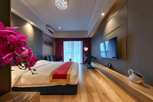 Imagen de la habitación del Hotel Heefun Apartment - Fuli New World Plaza. Foto 5