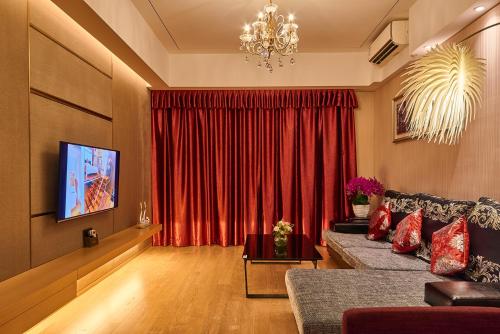 Imagen de la habitación del Hotel Heefun Apartment - Fuli New World Plaza. Foto 7