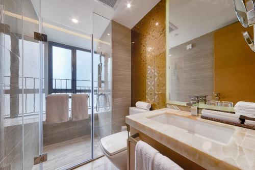 Imagen de la habitación del Hotel Heefun Apartment - Fuli New World Plaza. Foto 9