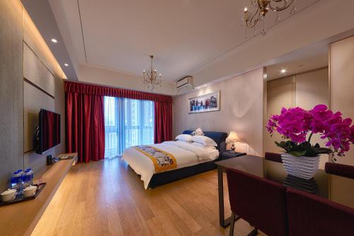 Imagen general del Hotel Heefun Apartment - Fuli New World Plaza. Foto 4