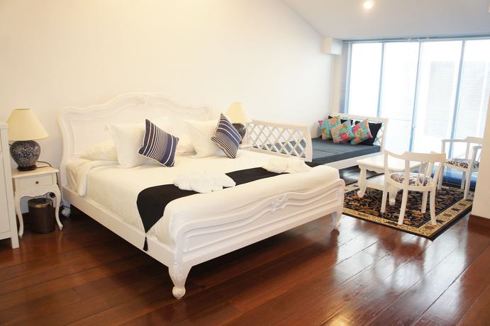Imagen de la habitación del Hotel Heeren Palm Suites. Foto 2