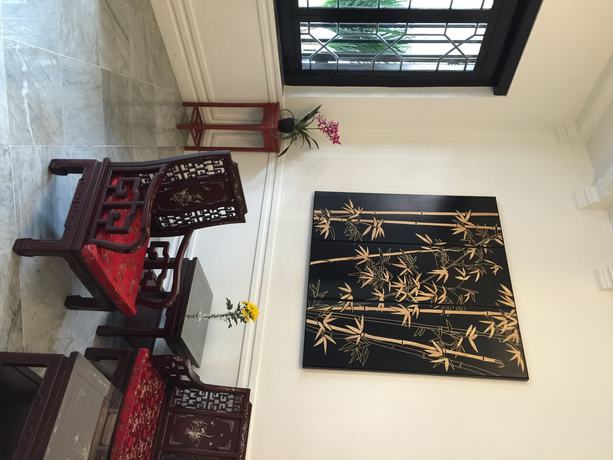 Imagen de la habitación del Hotel Heeren Palm Suites. Foto 3