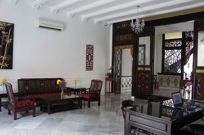 Imagen de la habitación del Hotel Heeren Palm Suites. Foto 4