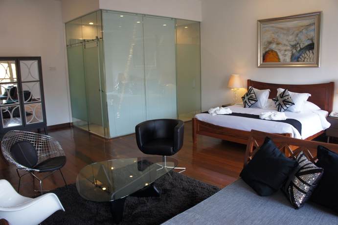 Imagen de la habitación del Hotel Heeren Palm Suites. Foto 6