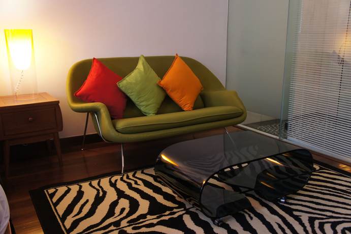 Imagen de la habitación del Hotel Heeren Palm Suites. Foto 8