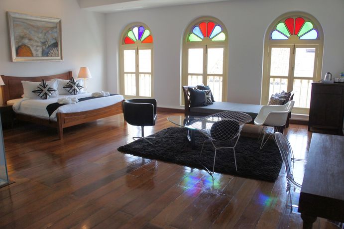 Imagen de la habitación del Hotel Heeren Palm Suites. Foto 9
