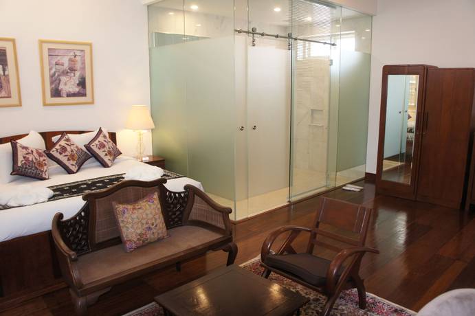 Imagen de la habitación del Hotel Heeren Palm Suites. Foto 10
