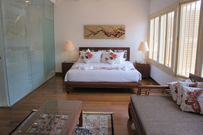 Imagen de la habitación del Hotel Heeren Palm Suites. Foto 11