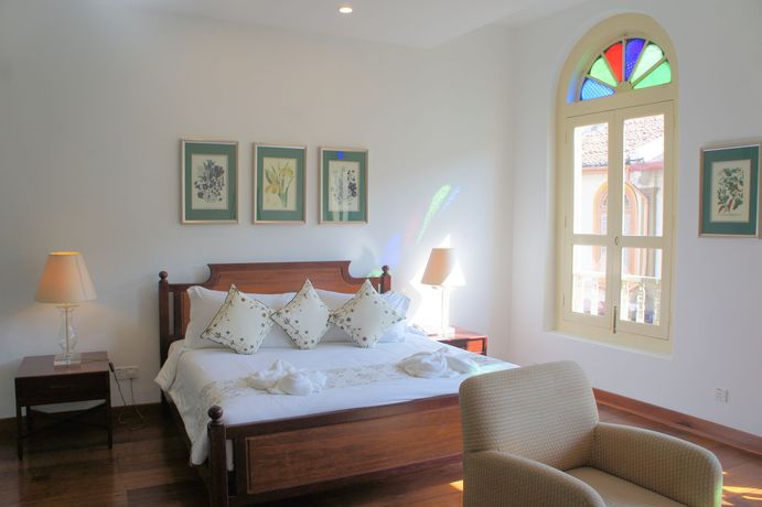Imagen de la habitación del Hotel Heeren Palm Suites. Foto 12