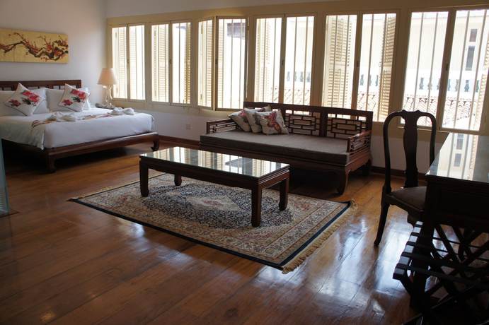 Imagen de la habitación del Hotel Heeren Palm Suites. Foto 13
