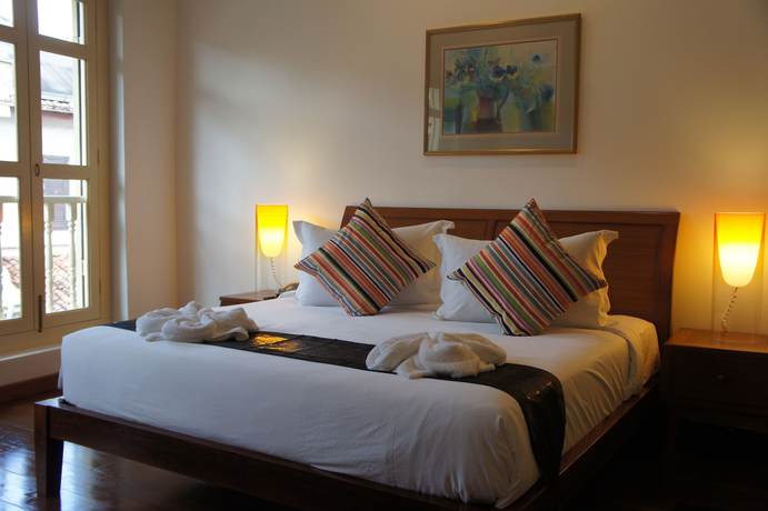 Imagen de la habitación del Hotel Heeren Palm Suites. Foto 14