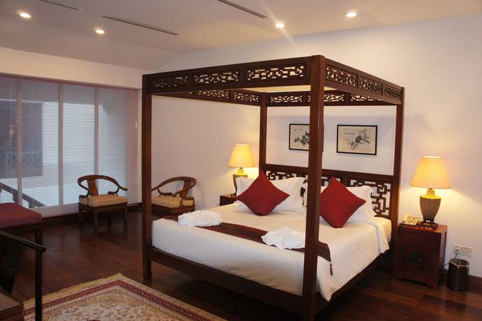 Imagen de la habitación del Hotel Heeren Palm Suites. Foto 15