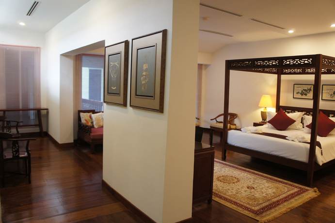 Imagen de la habitación del Hotel Heeren Palm Suites. Foto 16