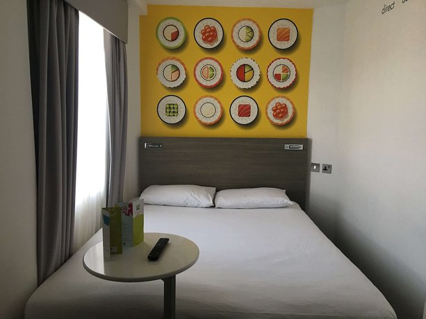 Imagen de la habitación del Hotel Heeton Concept Kensington. Foto 15