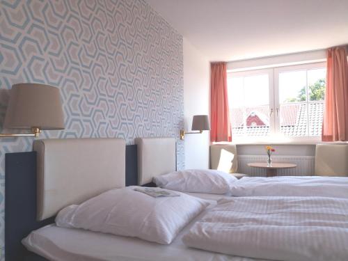 Imagen de la habitación del Hotel Heide Reinstorf. Foto 19