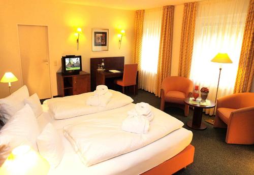 Imagen de la habitación del Hotel Heidehotel Waldh&uuml;tte. Foto 4