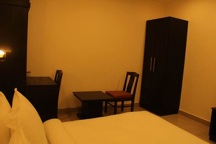 Imagen de la habitación del Hotel Height View Residency. Foto 17