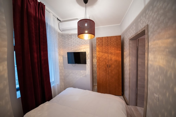 Imagen de la habitación del Hotel Heights Accommodation City Center. Foto 9