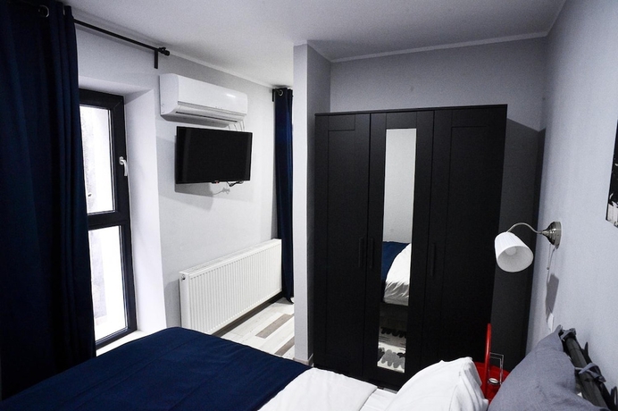 Imagen de la habitación del Hotel Heights Accommodation City Center. Foto 12