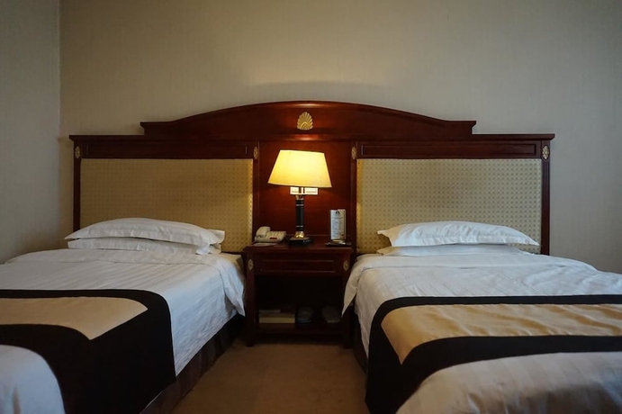 Imagen de la habitación del Hotel Heilongjiang Kunlun. Foto 11