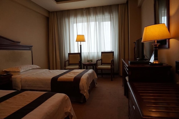Imagen de la habitación del Hotel Heilongjiang Kunlun. Foto 15
