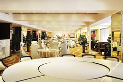 Imagen del bar/restaurante del Hotel Heilongjiang Trado Union Mansion. Foto 2