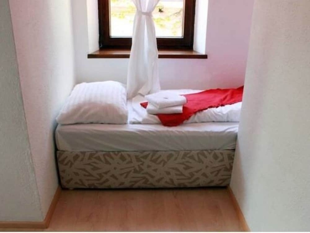 Imagen de la habitación del Hotel Heimgartl. Foto 11