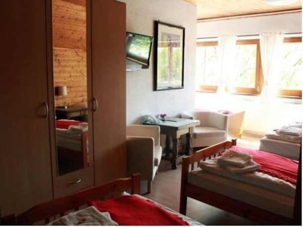 Imagen de la habitación del Hotel Heimgartl. Foto 13