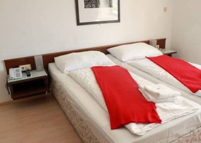 Imagen de la habitación del Hotel Heimgartl. Foto 18