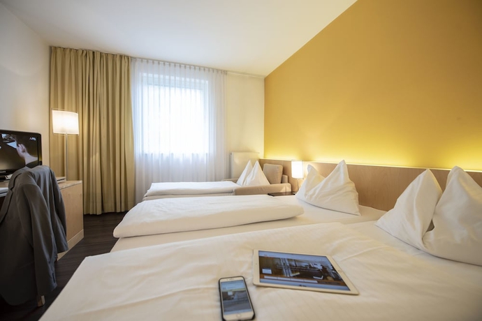 Imagen de la habitación del Hotel Heinhotel Vienna Airport. Foto 2