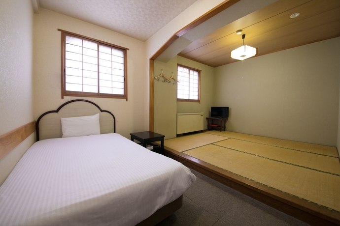 Imagen de la habitación del Hotel Heiwadai Otemon. Foto 5