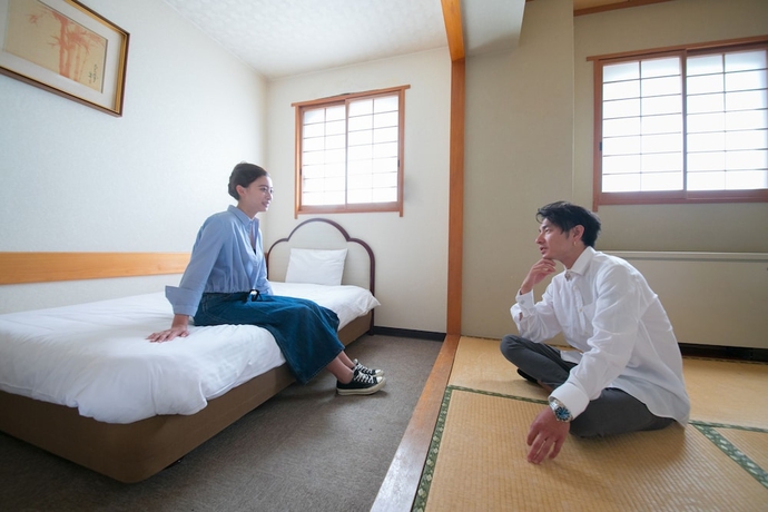 Imagen de la habitación del Hotel Heiwadai Otemon. Foto 11