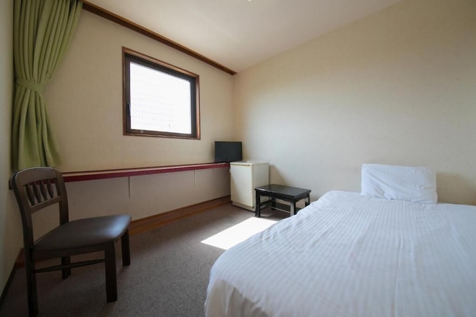 Imagen de la habitación del Hotel Heiwadai Otemon. Foto 15