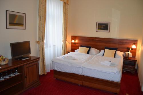 Imagen de la habitación del Hotel Hejtmansk&yacute; dvůr. Foto 8