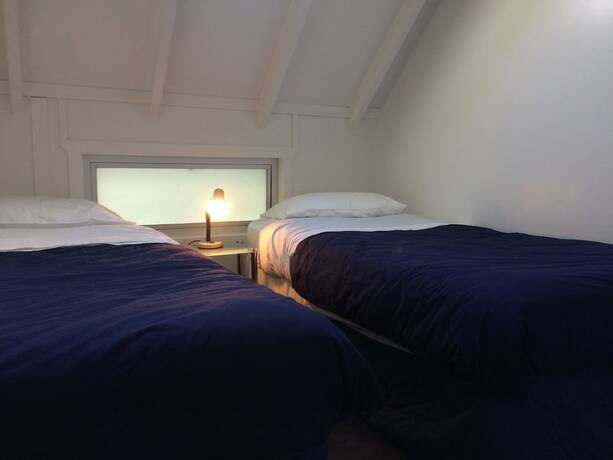 Imagen de la habitación del Hotel Hekerua Lodge Boutique Backpackers. Foto 11