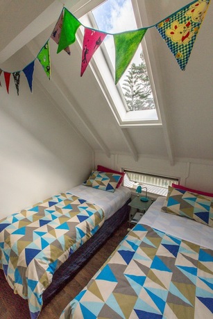 Imagen de la habitación del Hotel Hekerua Lodge Boutique Backpackers. Foto 17