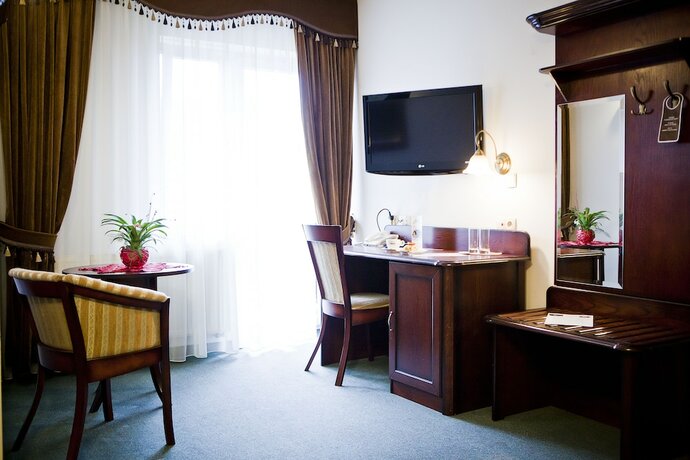 Imagen de la habitación del Hotel Helan Family and Garden. Foto 11
