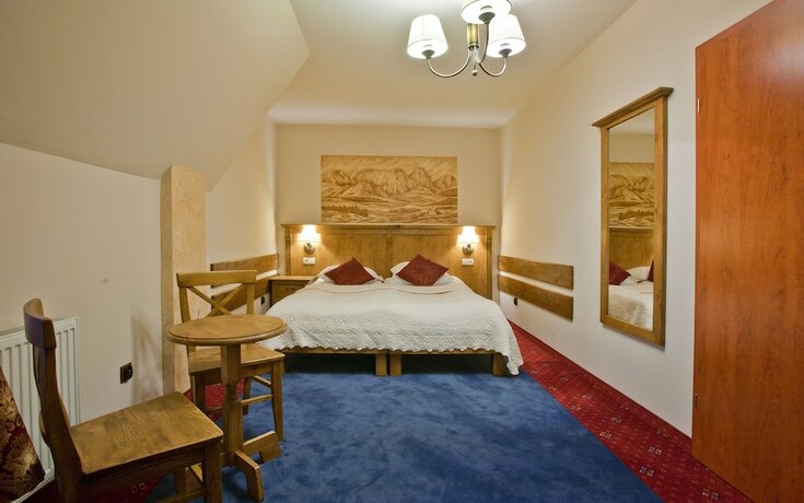 Imagen de la habitación del Hotel Helan Family and Garden. Foto 12