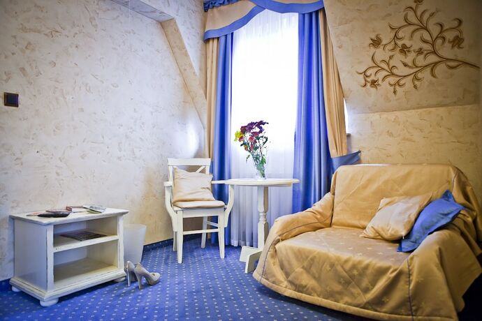 Imagen de la habitación del Hotel Helan Family and Garden. Foto 13