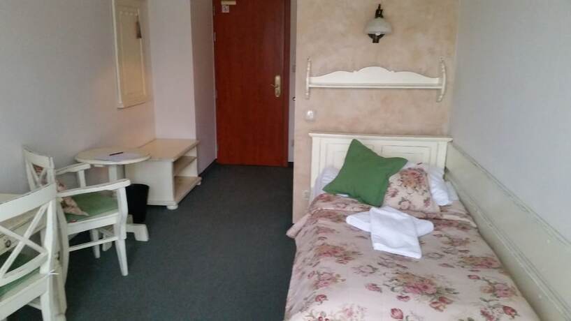 Imagen de la habitación del Hotel Helan Family and Garden. Foto 14