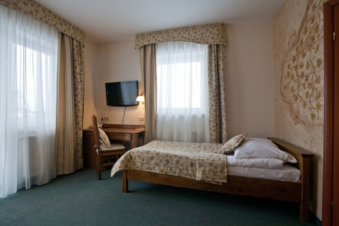 Imagen de la habitación del Hotel Helan Family and Garden. Foto 15