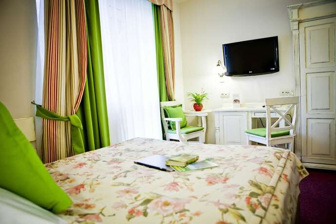 Imagen de la habitación del Hotel Helan Family and Garden. Foto 16